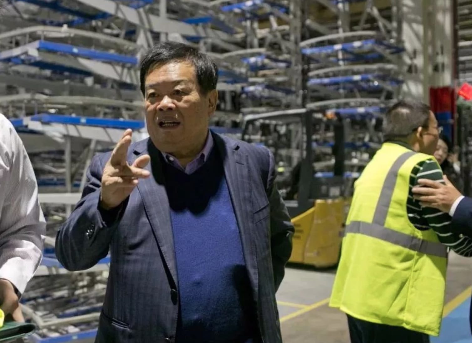 Glass king Cao Dewang says US ban on Huawei for chips unacceptable